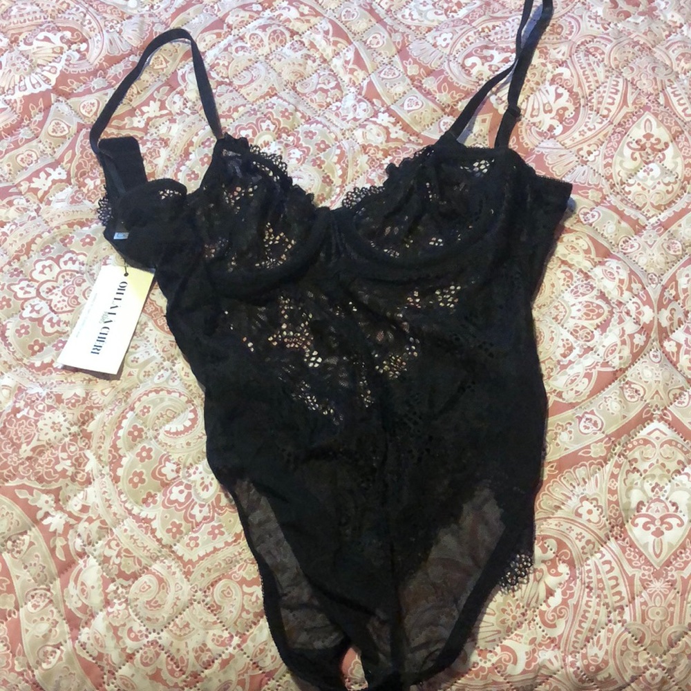Brand new…never worn one piece black unlined lace teddy with underwire.